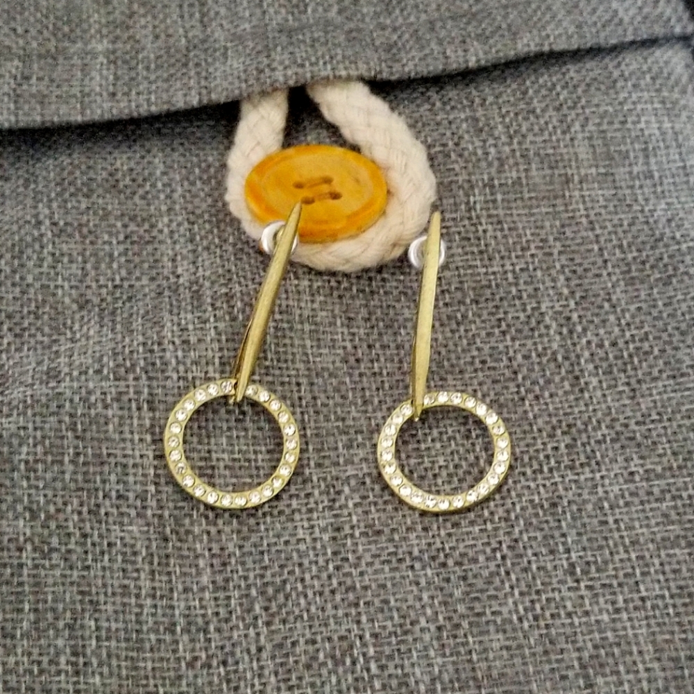 Gold circle drop earrings